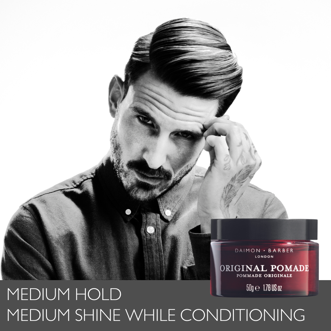 Male model in black and white with slicked back hair with Original Pomade Jar