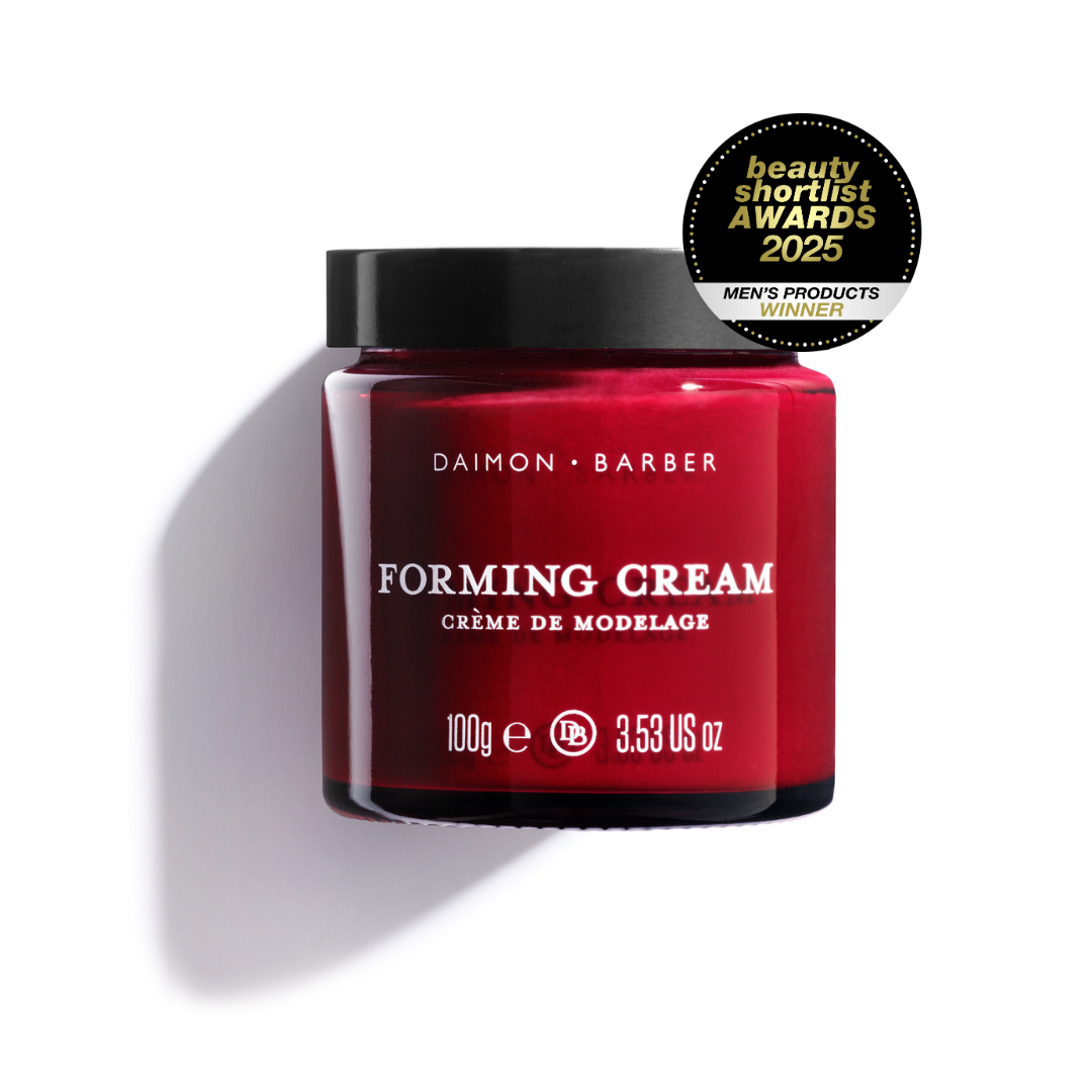 A red jar of DAIMON BARBER Forming Cream, with a black beauty shortlist awards 2025 winner badge, placed on a white background.