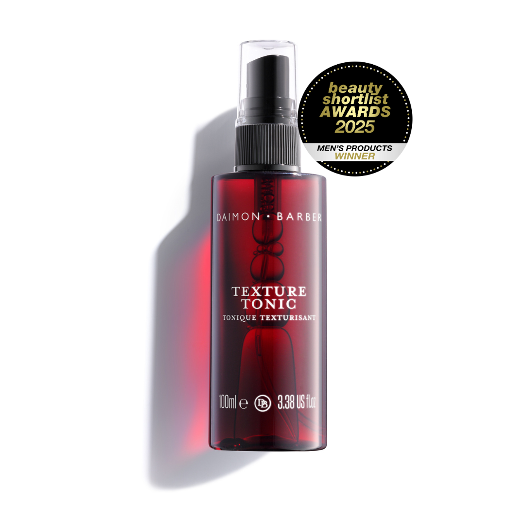 A red spray bottle labeled &