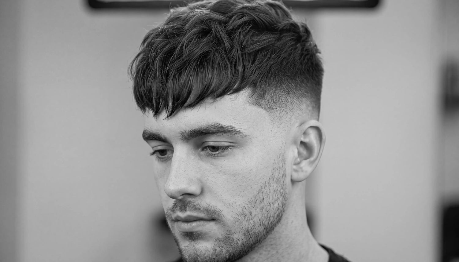 Shot of man with French Crop Haircut with fade in black and white