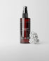 Texture Tonic bottle on grey background with piece of coral