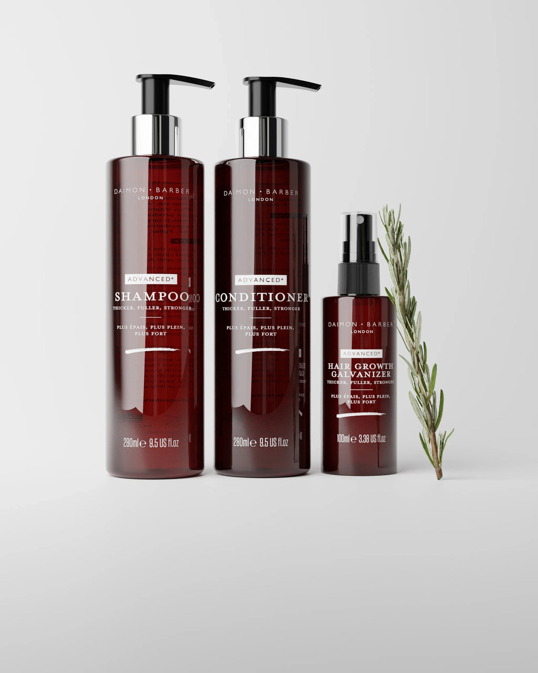 Set of hair care products including shampoo, conditioner, and hair growth galvanizer on a light grey background.
